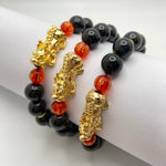 BLACK ONYX W/ GOLD PLATED PIXIU AND RED BEAD - 10MM